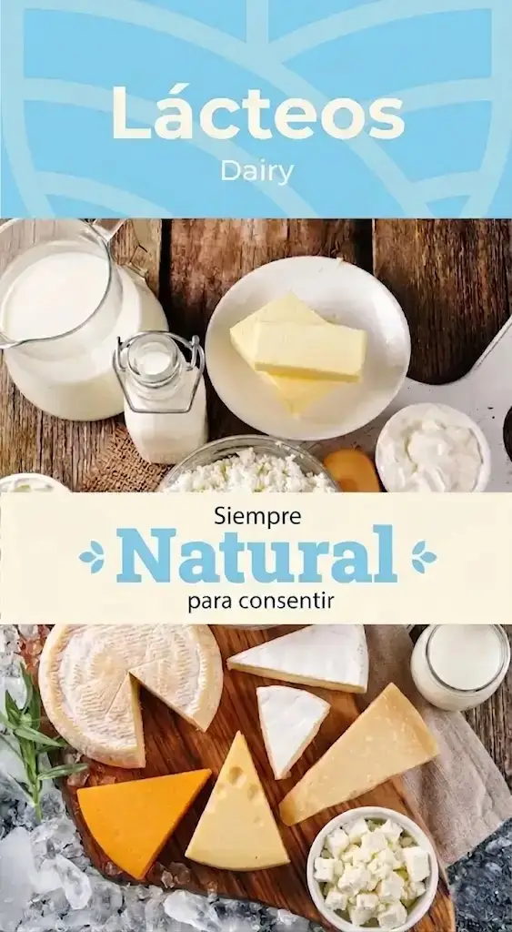 Publicidad de productos lácteos que muestra una variedad de quesos, leche, mantequilla y requesón sobre una mesa de madera, con el texto central "Siempre Natural para consentir".